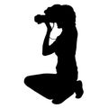 Cameraman with video camera. Silhouettes on white background. Vector illustration Royalty Free Stock Photo