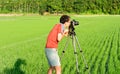 Cameraman work in the countryside Royalty Free Stock Photo