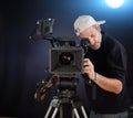 Cameraman working with a cinema camera Royalty Free Stock Photo