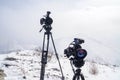 Cameras Canon on top of the mountain Royalty Free Stock Photo