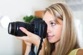 Camerawoman taking images indoor Royalty Free Stock Photo