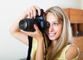 Camerawoman taking images indoor Royalty Free Stock Photo