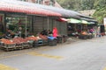 CAMERON HIGHLAND, MALAYSIA - FEBRUARY 2019 : Tourists shop in the local market in Raining Season in Cameron Highlands. Cameron