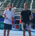 Cameron Norrie of Great Britain L and Sebastian Korda of USA in action before quarter-final match at the 2022 Delray Beach Open