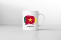 Cameroon flag on white coffee mug.