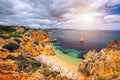 Camilo beach (Praia do Camilo) in Lagos, Algarve, Portugal. Wooden footbridge to the beach Praia do Camilo, Portugal. Picturesque Royalty Free Stock Photo