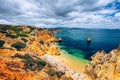 Camilo beach (Praia do Camilo) in Lagos, Algarve, Portugal. Wooden footbridge to the beach Praia do Camilo, Portugal. Picturesque Royalty Free Stock Photo