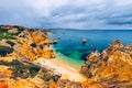 Camilo beach Praia do Camilo in Lagos, Algarve, Portugal. Wooden footbridge to the beach Praia do Camilo, Portugal. Picturesque Royalty Free Stock Photo