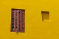 Caminito Street in La Boca with the colorful window and a yellow wall, Buenos Aires