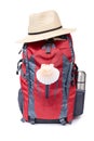 Camino de Santiago equipment. Pilgrim backpack with scallop symbol and hat isolated on white background Royalty Free Stock Photo