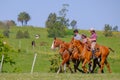 CAMINOS, CANELONES, URUGUAY, OCT 7, 2018: Gaucho family riding on horses at a Criolla Festival in Uruguay