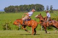 CAMINOS, CANELONES, URUGUAY, OCT 7, 2018: Gaucho riding on a wild untamed horse at a Criolla Festival in Uruguay