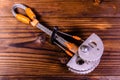 Camming device friend for rock climbing on wooden table. Top vie Royalty Free Stock Photo