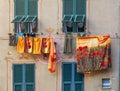 Camogli house facade with colorful laundry. Color image Royalty Free Stock Photo