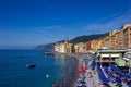 Camogli, Italy - September 15, 2019: People resting at beach at Camogli on sunny summer day