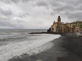 Camogli, Liguria, Italy picturesque fishermen village during sea storm swell Royalty Free Stock Photo