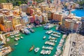 Camogli Marina aerial view. Boats and yachts moored in harbor with green water. A lot fo colorful buildings Royalty Free Stock Photo