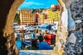 Camogli port village cityscape with colored houses and boats, Liguria