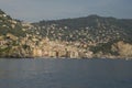 Camogli typical village with colorful houses and small harbor in Italy, Liguria in a sunny day view from the boat