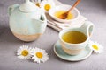 Camomille tea in handmade ceramic cup Royalty Free Stock Photo