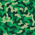 Camouflage with geometric pattern, seamless texture. Abstract trendy wallpaper in military style. Green khaki color background. Royalty Free Stock Photo
