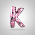 Camouflage letter K uppercase with pink, grey, black and white camouflage pattern isolated on white background. Royalty Free Stock Photo