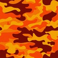 Camouflage pattern background. Classic clothing style masking camo repeat print. Fire orange brown yellow colors forest