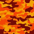 Camouflage pattern background. Classic clothing style masking camo repeat print. Fire orange brown yellow colors forest Royalty Free Stock Photo