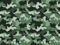 Camouflage pattern background in green colors, seamless. Military fashion abstract geometric texture Royalty Free Stock Photo