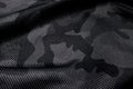 Camouflage pattern. Trendy dark gray camouflage fabric. Military texture. Dark back Royalty Free Stock Photo
