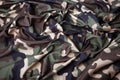 Camouflage textured fabric wavy background