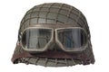 Camouflaged nazi army german helmet with mesh helmet net cover and protective goggles Royalty Free Stock Photo