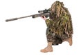 Camouflaged sniper in ghillie suit