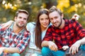 Camp adventure and travel concept. Young friends having a picnic. Pleasant weekend near campfire. Friends hikers Royalty Free Stock Photo