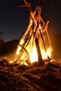 Camp fire on the beach at night