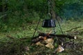 Camp fire black kettle pot soup cook vacation forest