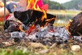 Camp Fire. Yellow orange flare of light from burned, Fire flame burn on wood with red and black on coal