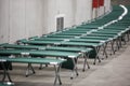 Camp folding cots are being set up in the underground parking of