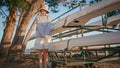 Camp girl enjoying evening on lake weekend. Carefree traveler posing on sunset Royalty Free Stock Photo