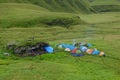 Camp site trekkers blue and orange tents green dzukou valley eco tourism