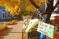 Camp & tent setup of Occupy Canada gathering at Victoria Square, Montreal, Canada during fall autumn with yellow leaves on trees Royalty Free Stock Photo