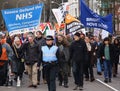 Campaigners march through Brighton, UK in protest against the planned cuts to public sector services. The march was organised by B Royalty Free Stock Photo