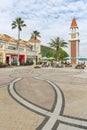 Campanile and restaurant in outdoor shopping mall in Discovery Bay, Hong Kong