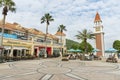 Campanile and restaurant in outdoor shopping mall in Discovery Bay, Hong Kong