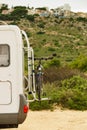 Camper with bicycle on back rack Royalty Free Stock Photo