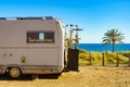 Camper with bicycles on beach, camping on sea