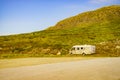 Camper car on road in norwegian mountains