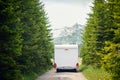 camper on a mountain road.Freedom car travel concept Royalty Free Stock Photo