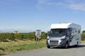 Camper at a road in France near a vineyard