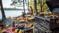 A camper unpacks a portable grill to cook up some burgers and hot dogs for a lakeside picnic with fellow adventurers